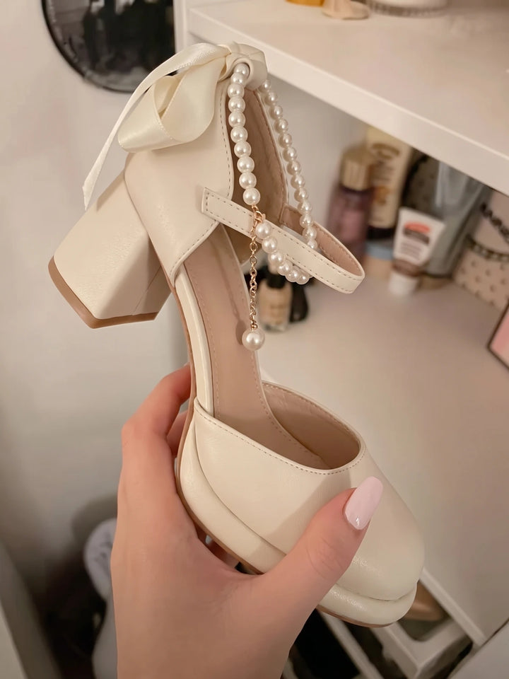 Ottavienne Pearl Bow Block Heels