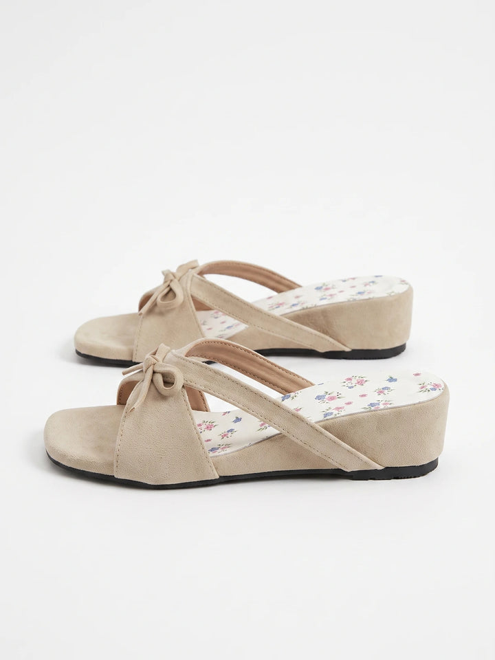 Josselyn Beige Suede Bow Wedge Slides