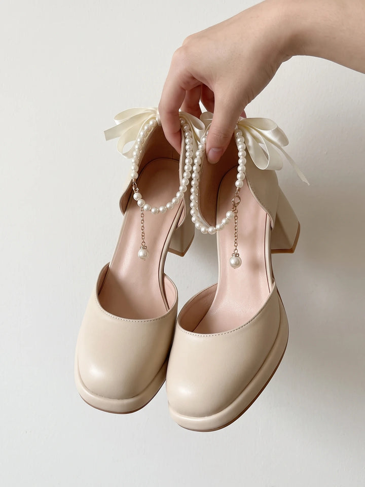 Ottavienne Pearl Bow Block Heels