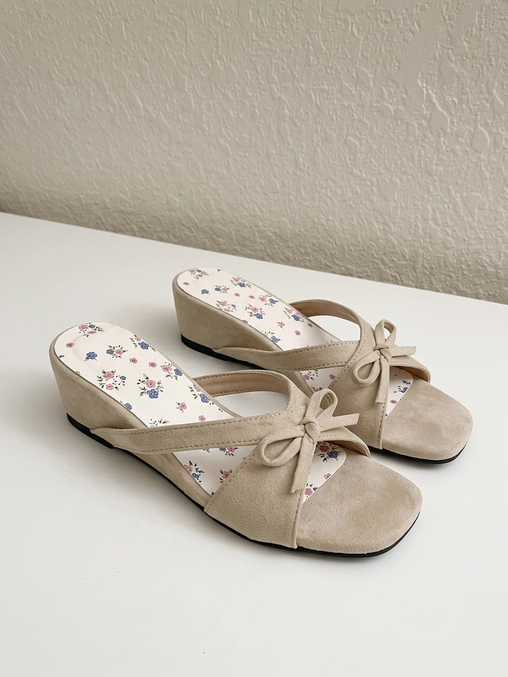 Josselyn Beige Suede Bow Wedge Slides