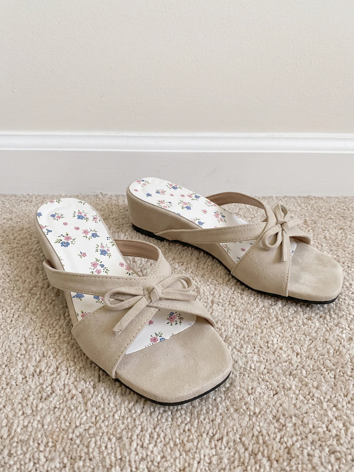 Josselyn Beige Suede Bow Wedge Slides